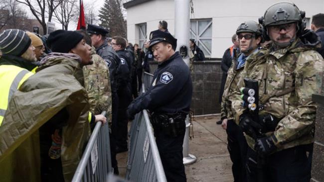 Black Lives Matter protesters surrounded a key police station Wednesday in Minnesota near where Jamar Clark was shot