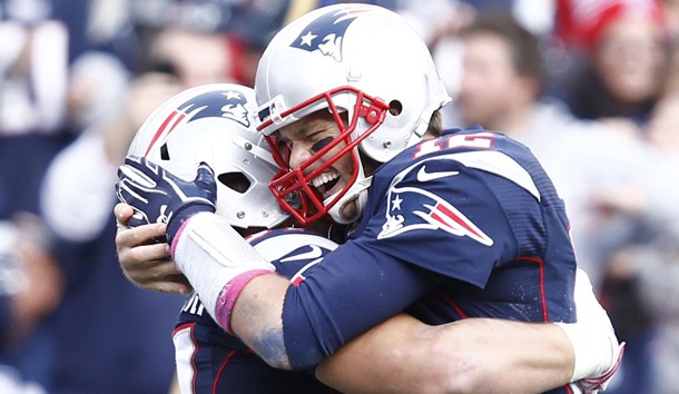 Oct 25 2015 Foxborough MA USA New England Patriots tight end Rob Gronkowski and quarterback Tom Brady celebrate a touchdown against the New York Jets during the second half at Gillette Stadium. Mark L. Baer-USA TODAY Sports