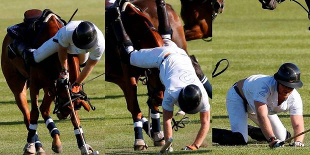 Britain's Prince Harry falls from his horse during the Sentebale Royal Salute Polo Cup in Paarl