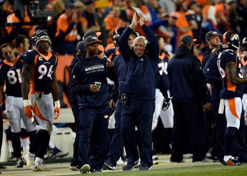 Broncos defensive coordinator Wade Phillips celebrates the safety in the fourth quarter against the Packers