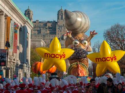 Performers stand in front of balloons at the start of the Macy's Thanksgiving Day Parade Thursday Nov. 26 2015 in New York. /Bryan R. Smith  AP