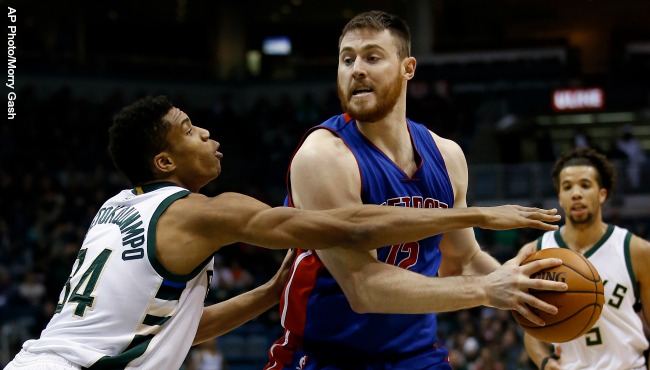 Detroit Pistons&#039 Aron Baynes tries to drive past Milwaukee Bucks&#039 Giannis Antetokounmpo during the first half of an NBA basketball game Monday Nov. 23 2015 in Milwaukee