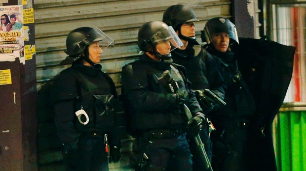 French special police forces before arresting those thought to be linked to the Paris attacks