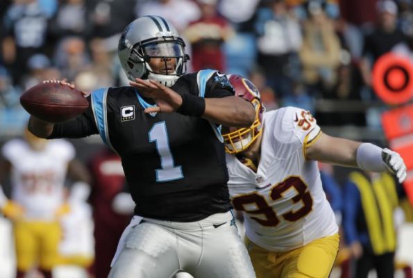 Carolina Panthers Cam Newton looks to pass