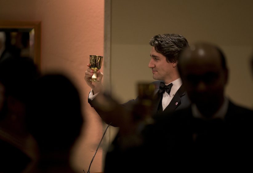 Canada Prime Minister Justin Trudeau toasts in honor of Queen Elizabeth II after delivering his speech before a gala dinner during the CHOGM Commonwealth Heads of Government Meeting in Attard Malta Friday Nov. 27 2015