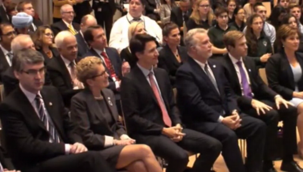 Kathleen Wynne sits with Justin Trudeau