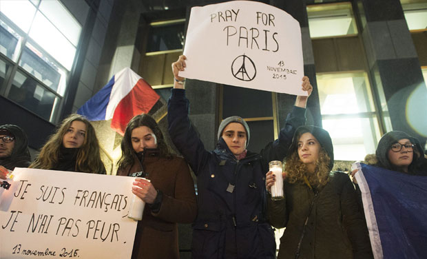 Montreal lowers city hall flags following attacks in Paris