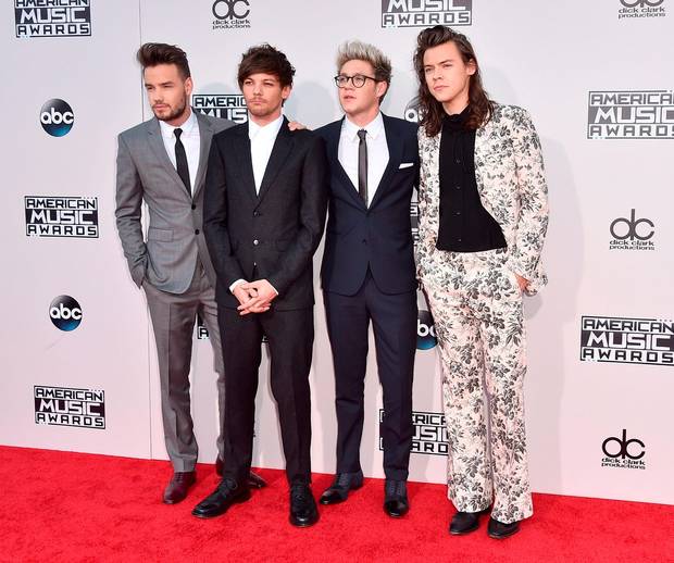 Liam Payne from left Louis Tomlinson Niall Horan and Harry Styles of One Direction arrive at the American Music Awards at the Microsoft Theater on Sunday Nov. 22 2015 in Los Angeles