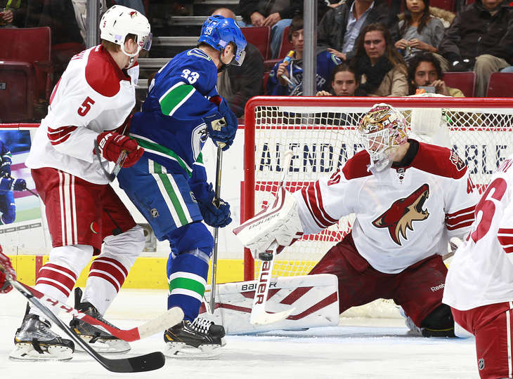 Canucks vs Coyotes Game Action