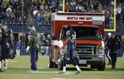 Arizona's Mike Iupati taken off on stretcher after collision