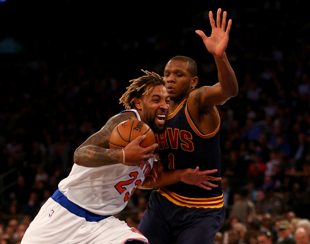 Derrick Williams #23 of the New York Knicks heads for the net as James Jones #1 of the Cleveland Cavaliers defends at Madison Square Garden