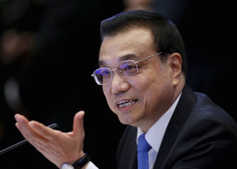 China's Premier Li Keqiang speaks during the 27th Asean Summit in Kuala Lumpur. Li says China will invest more in Malaysia's treasury bonds to help stabilise the financial market. – Reuters pic