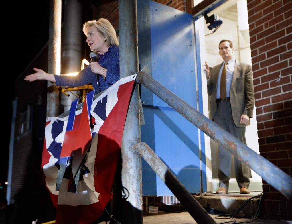 Democratic presidential candidate Hillary Rodham Clinton speaks from a gymnasium side porch to people who weren't able to fit in to hear her speech at Fisk University Friday Nov. 20 2015 in Nashville Tennesse