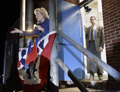 Democratic presidential candidate Hillary Rodham Clinton speaks from a gymnasium side porch to people who weren't able to fit in to hear her speech at Fisk University Friday Nov. 20 2015 in Nashville Tenn