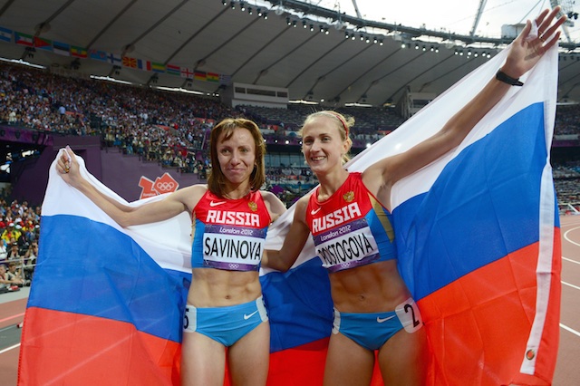 Russia's gold medalist Mariya Savinova celebrating with Russia's bronze medalist Ekaterina Poistogova at the end of the women's 800m final at the athletics event of the London 2012 Olympic Games. AFP