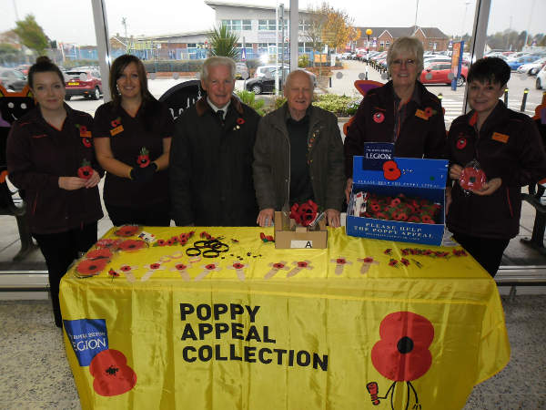 Colleagues from Mere Green store with Royal British Legion collectors Peter Dale and David Ballantyne