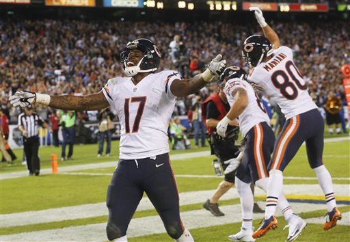 Chicago Bears wide receiver Alshon Jeffery celebrates a touchdown by teammate Zach Miller center during the second half of an NFL football game against the San Diego Chargers Monday Nov. 9 2015 in San Diego