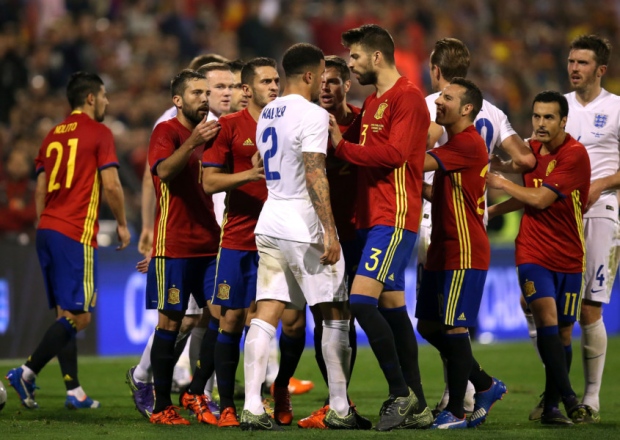 FRIENDLY?- Tempers flare between players from Spain and England during an international friendly at the Rico Perez Stadium Alicante. Spain won 2-0