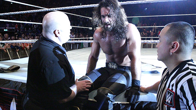 Current champion Seth Rollins being checked for injury following a match in Dublin Ireland.  credit