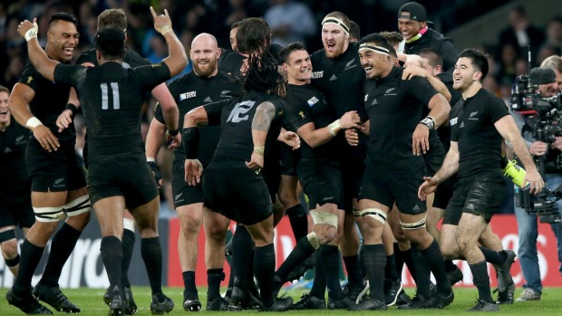 The All Blacks celebrate at the final whistle