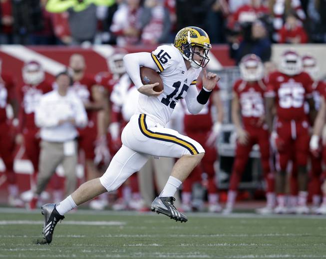 Darron Cummings  Associated Press Michigan’s Jake Rudock runs against Indiana