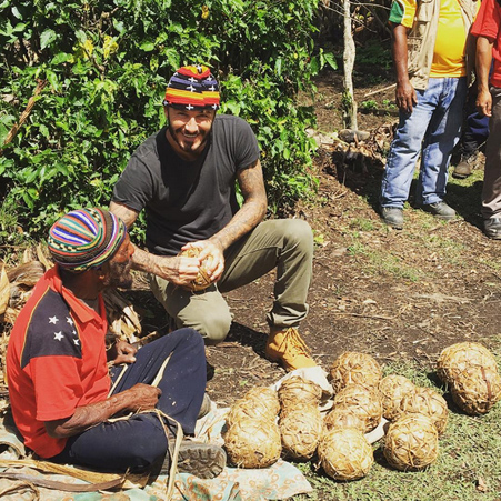 David Beckham makes his own football out of banana leaves as he kick starts global tour