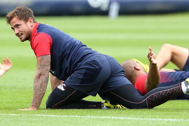 Danny Cipriani stretches during the England training session held at Pennyhill Park