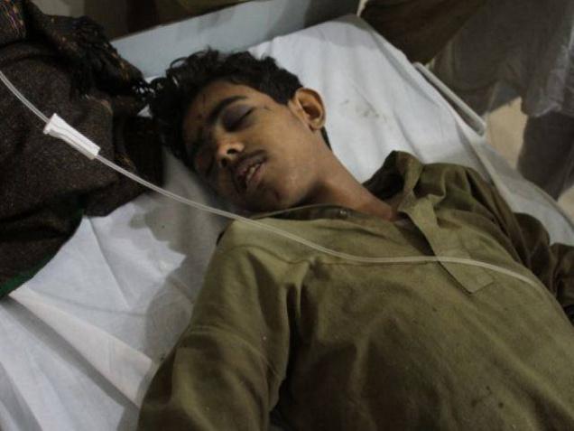 Pakistani teenager Muhammad Shahid who was rescued after 50 hours trapped under the rubble of a four-storey factory which collapsed resting at a local hospital in Lahore Pakistan on Friday. His family had assumed him to be dead and buried another body