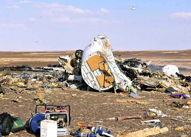 Debris from crashed Russian jet lies strewn across the sand at the site of the crash Sinai Egypt on 31 October 2015