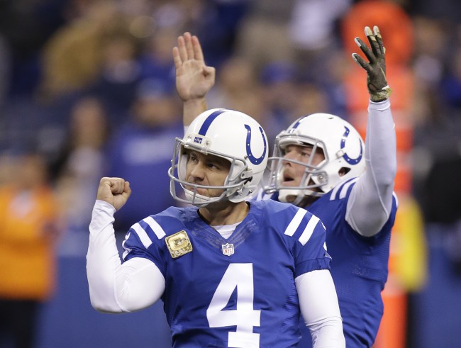 Indianapolis Colts&#039 Adam Vinatieri celebrates with teammate Pat Mc Afee after kicking a 55-yard field goal during the second half of an NFL football game against the Denver Broncos Sunday Nov. 8 2015 Indianapolis