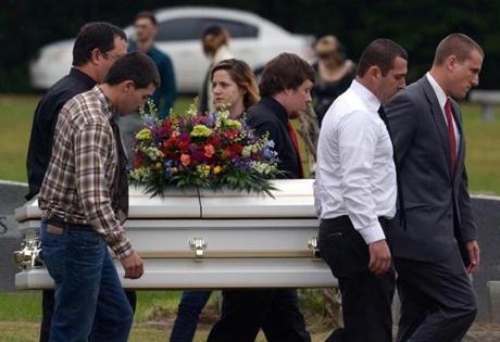 Pallbearers carried the casket of 6-year-old Jeremy Mardis to the grave site at Beaumont Cemetery in Beaumont Miss. Jeremy’s father remained in the hospital