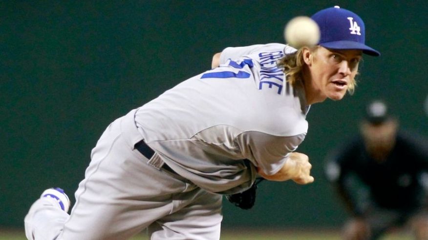 Los Angeles Dodgers starting pitcher Zach Greinke throws against the Arizona Diamondbacks during the first inning of a baseball game Sunday Sept. 13 2015 in Phoenix