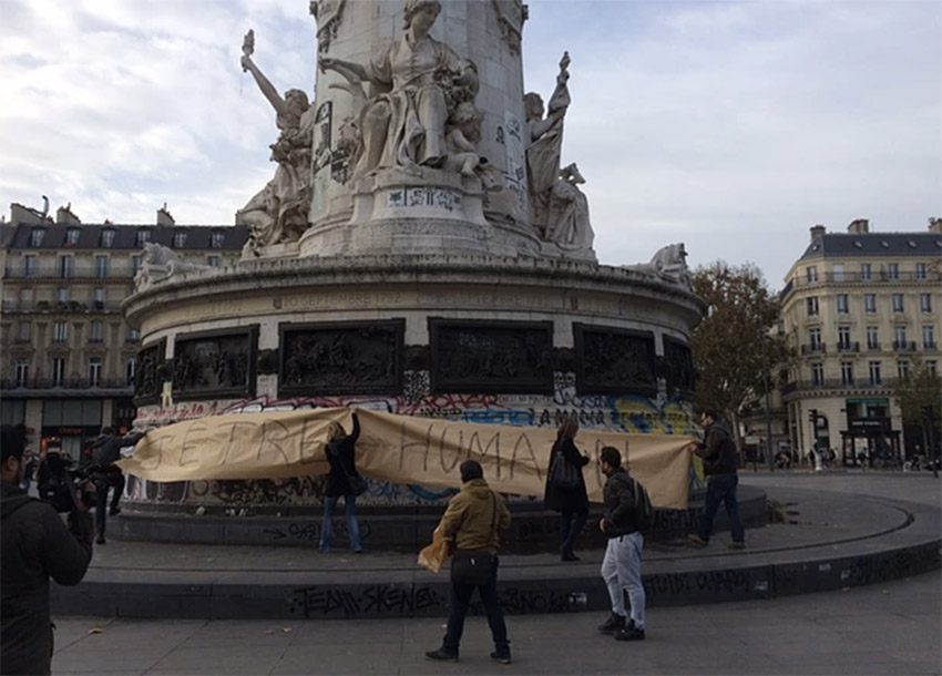 Parisians put up homemade poster near site of attacks