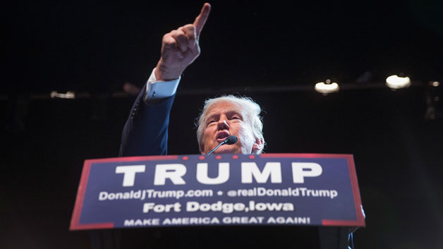 Republican presidential candidate Donald Trump speaks to guests during a campaign stop at Iowa Central Community College