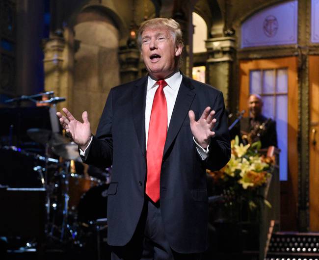 Republican presidential candidate Donald Trump speaks during the monologue as he guest hosts on'Saturday Night Live