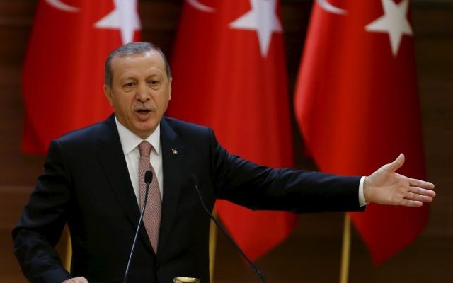 Turkish President Tayyip Erdogan makes a speech during his meeting with mukhtars at the Presidential Palace in Ankara Turkey