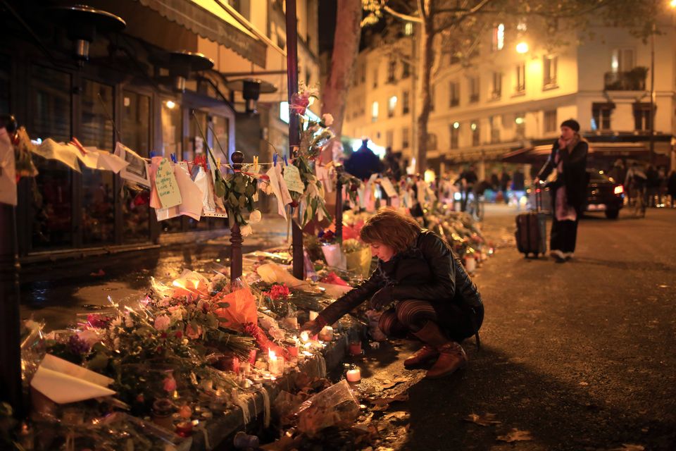 1 week after attacks defiant Parisians honor the dead