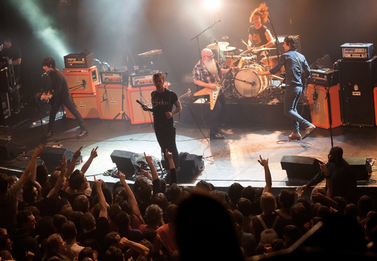 American rock group Eagles of Death Metal performing on stage at the Bataclan concert hall in Paris a few moments before men armed with assault rifles stormed into the venue killing 89 people