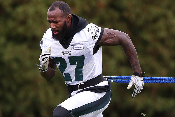 Malcolm Jenkins runs during practice