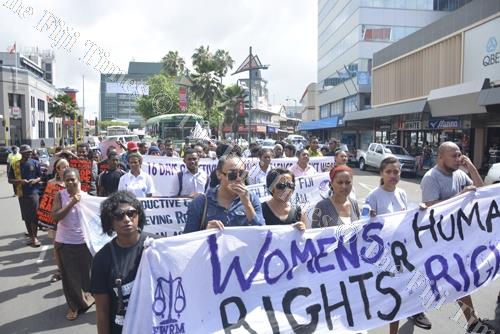 Advocates with their placards and banners in a march yesterday that marks the beginning of the 16 Days of Activism Against Gender Violence. The author says women and girls are not the only victims of
gender-based violence because it affects us all. Pict