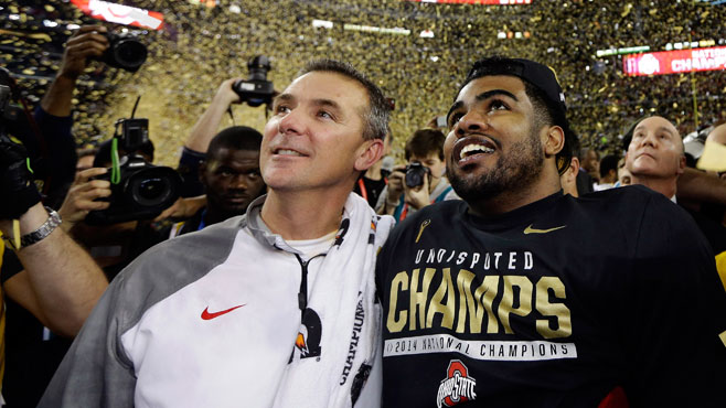 Ohio State head coach Urban Meyer left and Ezekiel Elliott celebrate after they defeated Oregon 42-20 in the NCAA college football playoff championship game in Arlington Texas. Elliott apologized for the critic