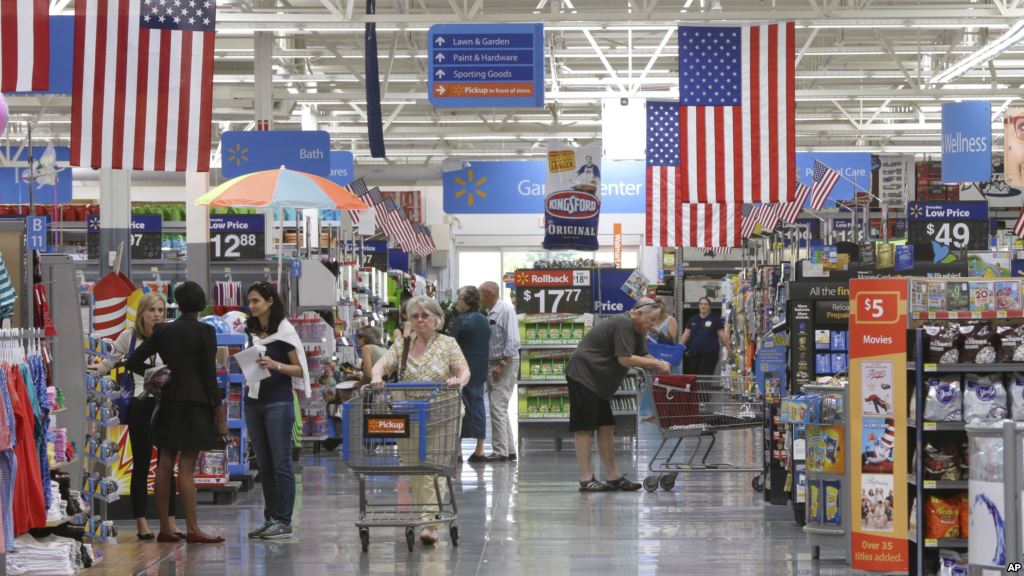 FILE- Customers shop at a Wal Mart Supercenter store in Springdale Arkansas