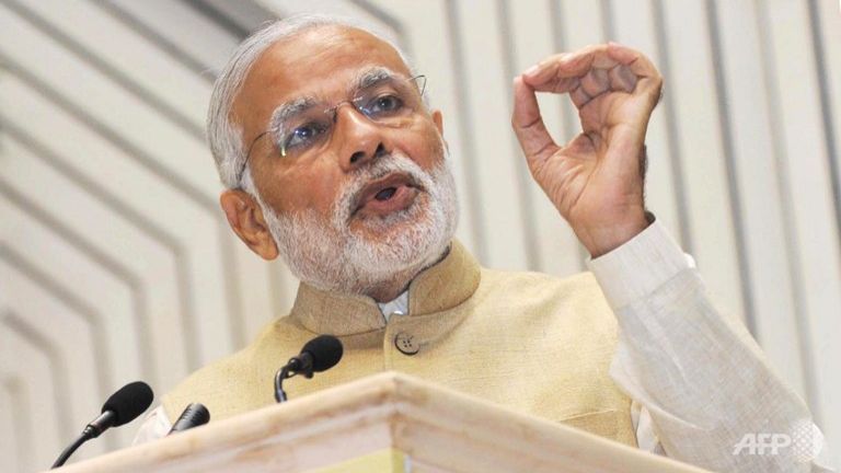 Narendra Modi gestures as he addresses The Delhi Economics Conclave 2015 in New Delhi