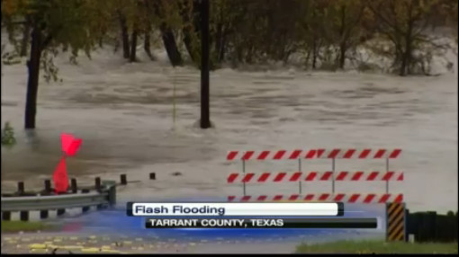 Torrential downpours across north Texas caused flooding on several streets and at least two people have been killed as a result of the rising water