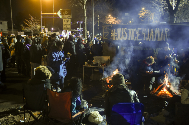 Demonstrators camp outside the Minneapolis Police Department¿s 4th Precinct during a protest for the death of Jamar Clark Tuesday Nov. 24 2015 in Minneap