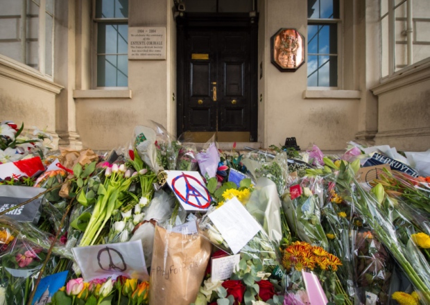 Floral tributes the victims of the terrorist attacks in Paris outside the French Embassy in London