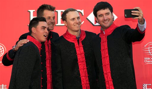 From left to right golf players Rickie Fowler Henrik Stenson Jordan Spieth and Bubba Watson take a selfie during the HSBC Champions golf tournament