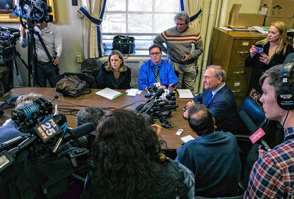 Former Governor Jim Gilmore addresses the press corps after he filed for the New Hampshire Primary Monday. - Concord Monitor