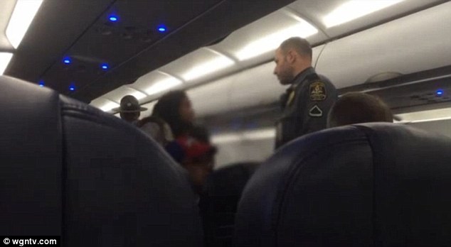 Four people were removed from a Chicago-bound Spirit Airlines Flight in Maryland on Tuesday morning