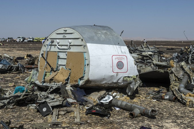 Debris of the A321 Russian airliner lie on the ground a day after the plane crashed in Wadi al-Zolomat a mountainous area in Egypt's Sinai Peninsula